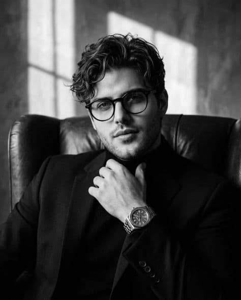 Portrait Interior Elegant Natural illuminated by dramatic chiaroscuro light in a professionally composed commercial setting.