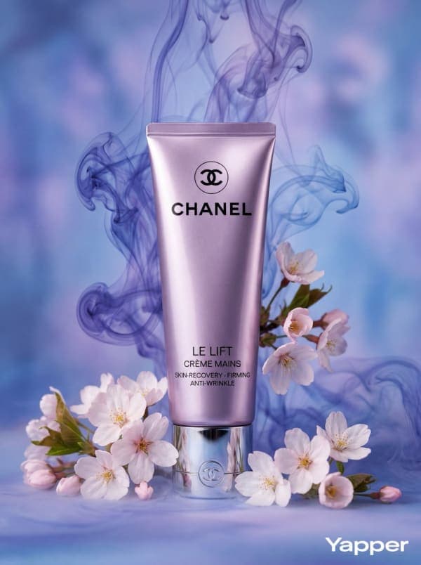 Luxury cosmetic product centered in frame with slow-moving blue volumetric clouds swirling around it in a cinematic premium beauty animation style.