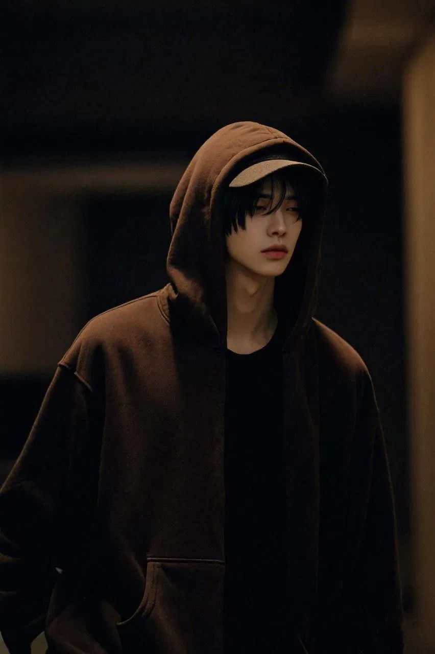 Warm Nocturnal Editorial Portrait in Espresso Hoodie